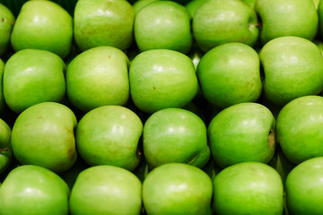 Row of green apples
