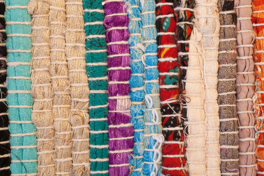 Jarapa. Textura de textiles. Fondo de textil. Fondo de colores. Alfombra.