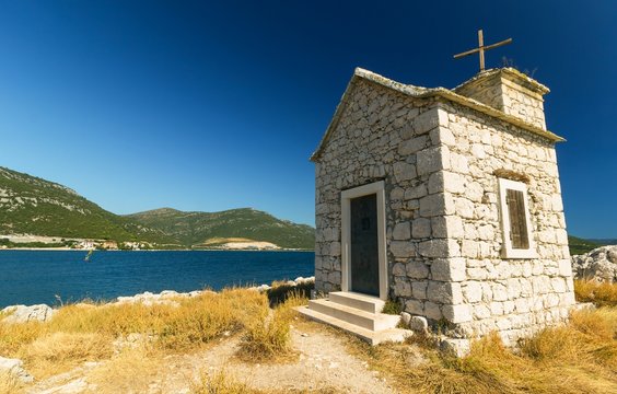 Small old chapel on island in Klek, Dalmatia, Croatia