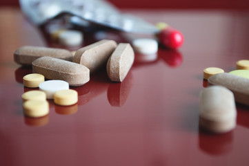 Different medical pills on the table