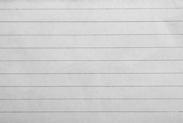 close up of a piece of note paper on white background