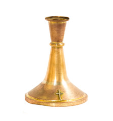 Fototapeta na wymiar Old brass candlestick with the cross on white background