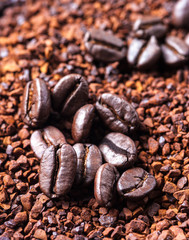 Coffee bean on ground coffee background.