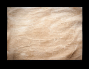 Old paper sheet isolated on black background