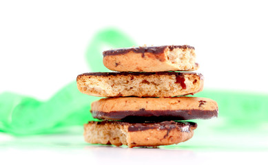 Baking with chocolate an tape measure on a white background.