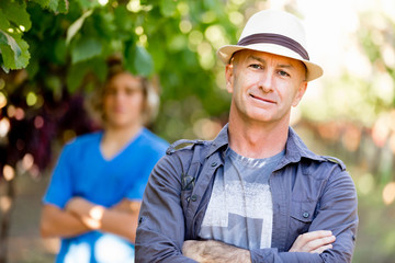 Father and son in vineyard