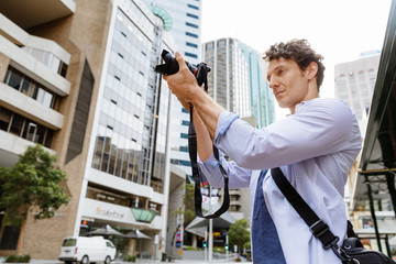 Male photographer taking picture