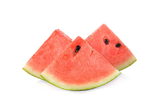 sliced watermelon with seed on white background