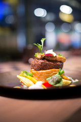 Fillet of Veal topped with Foie Gras. Garnished with vegetable