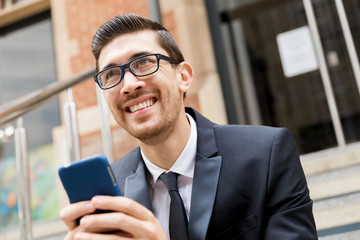 Portrait of handsome businessman outdoor