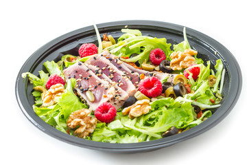 tuna sashimi with fresh salad , raspberry and nut