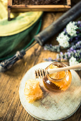 Beekeeper vintage tools and fresh honey