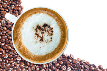 Hot coffee cup with clipping path and coffee beans top view on w