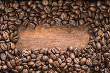 Coffee beand, copy space wooden background