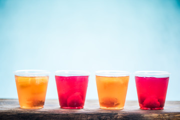 jelly with fruit pieces in cups