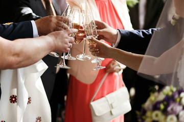 clink glasses of champagne