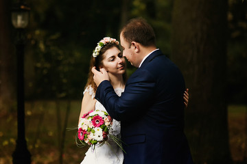 Young beautiful couple of happy newlyweds