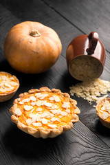 Pumpkin pie with almond slices