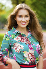 Naklejka premium Portrait of beautiful young happy woman