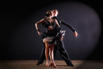 dancers in ballroom isolated on black background