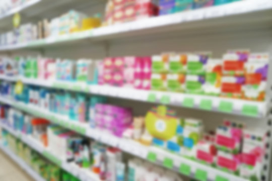 Skincare creams on shelves in supermarket