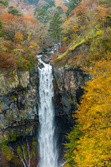 Famous Japanese waterfall Kegon at Nikko in color autumn time