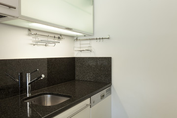 Domestic kitchen of empty apartment