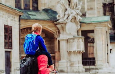 father and son travel in the city of Vienna, Austria