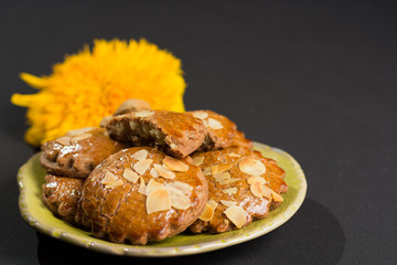 Typical Dutch filled spicy  cookies with almonds on autumn color