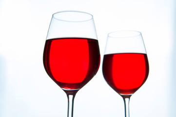 Two glasses of red wine isolated