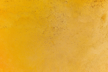 Yellow textured wall surface background