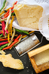 Parmesan cheese. Grated Parmesan cheese. Olive Wood Parmesan Cheese