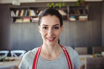 Portrait of female baker smiling