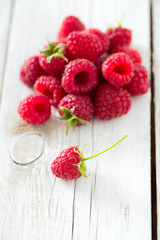 raspberries on wooden surface