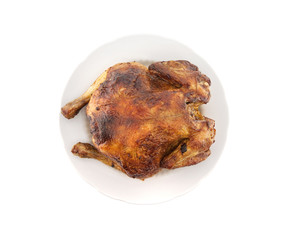 Whole roasted chicken isolated on white background. Top view