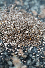 chia seeds on granite background