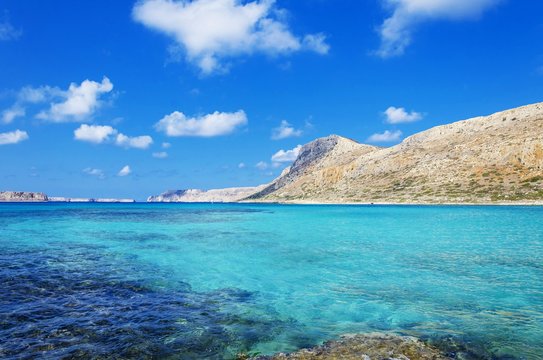 Cliffs and turquoise waters at Balos beach in island of Crete, Greece