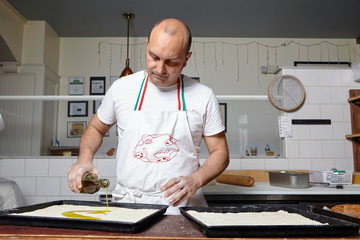 Baker working in bakery