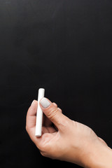 Empty blank black chalkboard with chalk traces