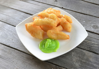 deep-fried dough stick (Patongko) with Pandan custard.