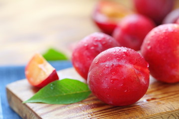 Ripe plums on the table