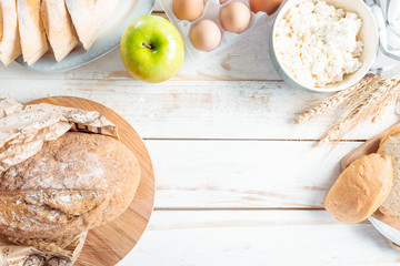 still life with dairy products, milk, eggs, bread
