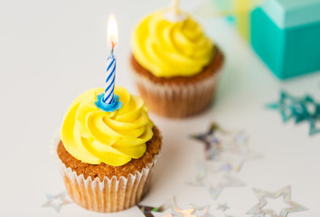 birthday cupcakes with burning candles