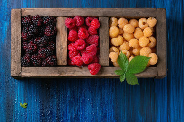 Heap of colorful raspberries 