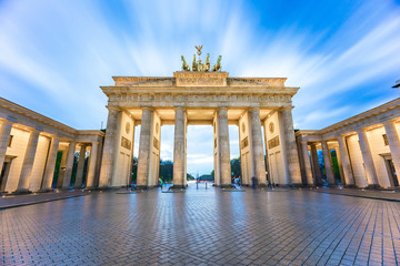 The long exposure view of Brandenburg Gate in Berlin, Germany - obrazy, fototapety, plakaty