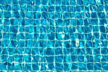 swimming pool water reflections with the sun