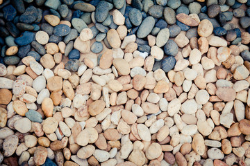 white ,gray ,orange pebbles background