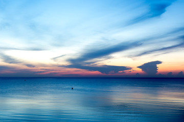 Fototapeta na wymiar beautiful sunrise sunset over the ocean in high contrast