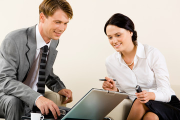 Obraz premium Image of businesswoman and businessman working together