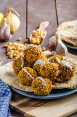 Falafel fried on naan bread